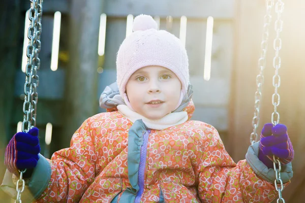 Portrait kid swinging. — Stock Photo, Image