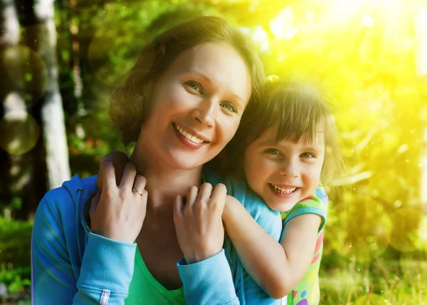 Daughter hugging mother. — Stock Photo, Image