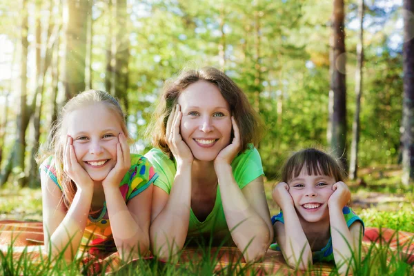 Beautiful mother and her daughters. — Stock Photo, Image