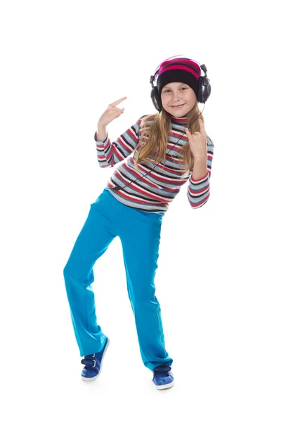 La chica de los auriculares bailando a la música . — Foto de Stock