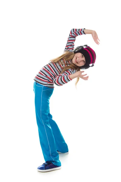 La chica de los auriculares bailando a la música . — Foto de Stock