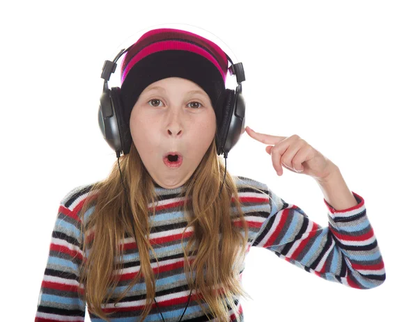 Dívka se sluchátky poslech hudby. — Stock fotografie