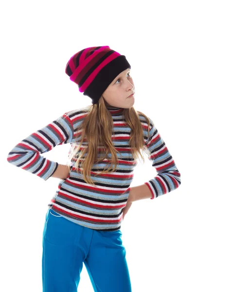 Beautiful girl in colored striped hat and sweater. — Stock Photo, Image