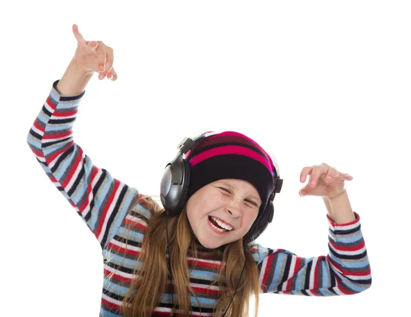 Mädchen mit Kopfhörern hört Musik. — Stockfoto