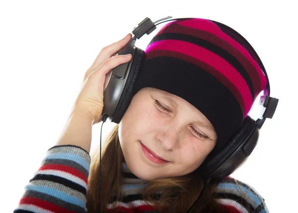 Chica con auriculares escuchando música. — Foto de Stock