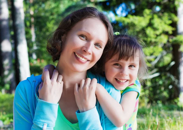 Daughter hugging mother. — Stock Photo, Image