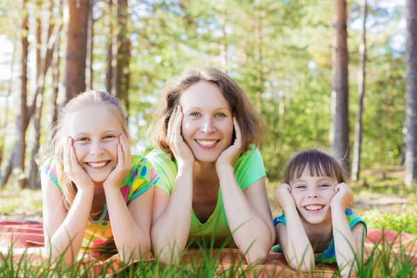 Beautiful mother and her daughters. — Stock Photo, Image