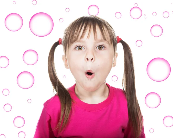 Happy little girl with pigtails. — Stock Photo, Image