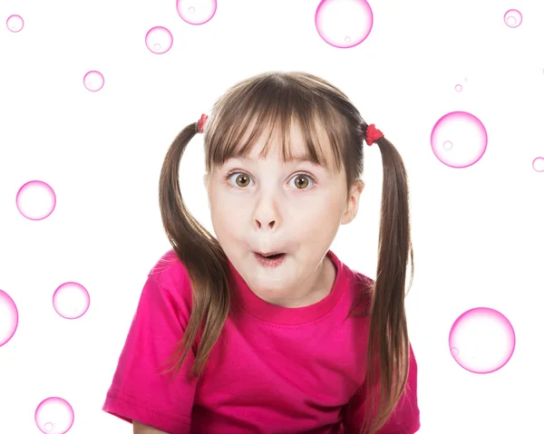 Happy little girl with pigtails. — Stock Photo, Image