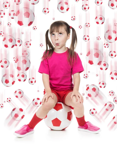 Liten flicka fotbollsspelare. — Stockfoto
