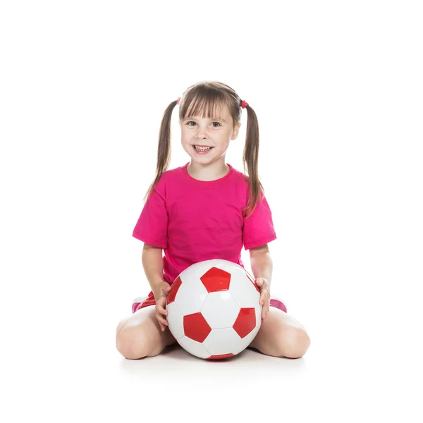 Little girl football player. — Stock Photo, Image