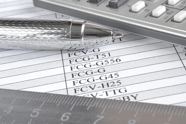 Business background with table, ruler, pen and calculator — Stock Photo, Image