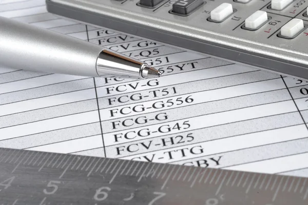 Business background with table, ruler, pen and calculator — Stock Photo, Image