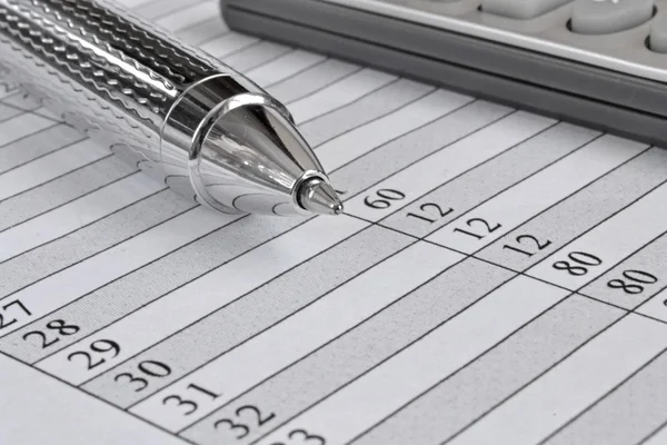 Business background with table, pen and calculator — Stock Photo, Image