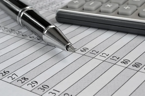 Business background with table, pen and calculator — Stock Photo, Image