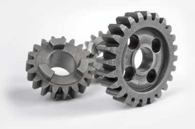 beyaz zemin üzerinde üç metal Dişliler