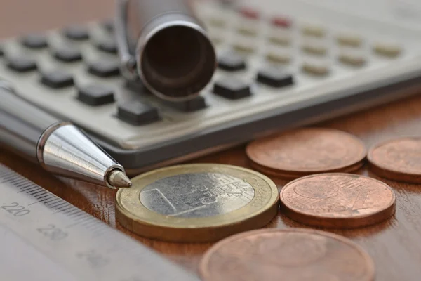 Financial background with money, calculator, ruler, table and pen — Stock Photo, Image