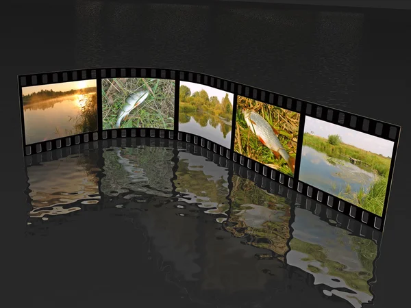 Rouleau de film avec des images en couleur (nature) sur fond noir — Photo