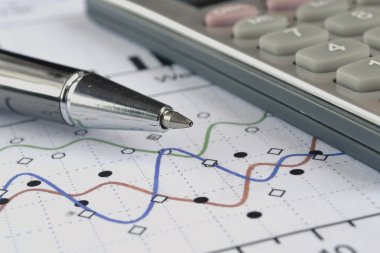 grafik, kalem ve hesap makinesi ile iş arka