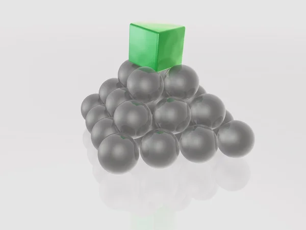 Зеленый куб и серые сферы как абстрактный фон — стоковое фото