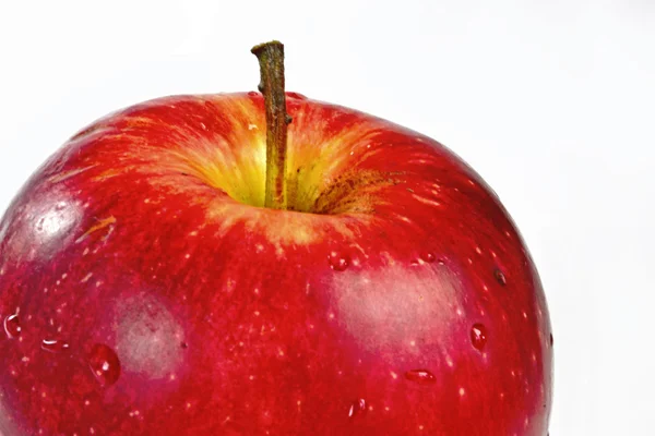 Parte de la manzana roja sobre el fondo blanco — Foto de Stock