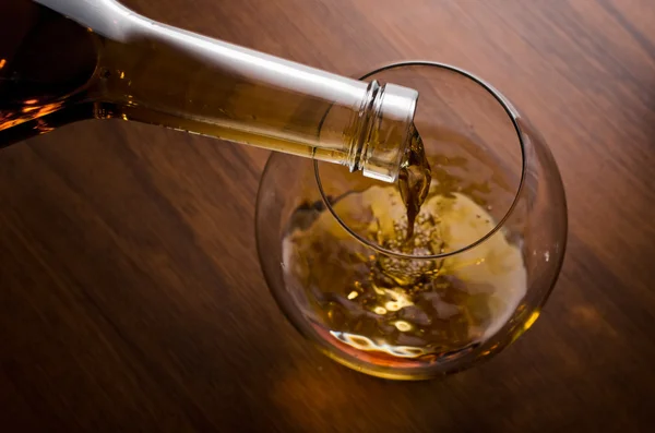 Old cognac in glass — Stock Photo, Image