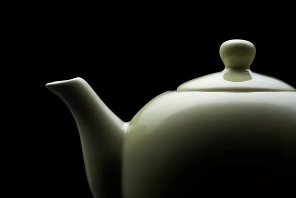 Teapot on black Stock Photo