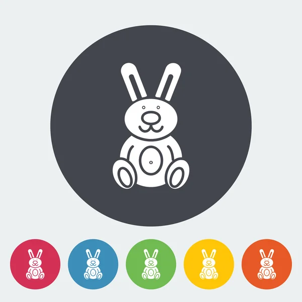 Conejo juguete plano icono — Vector de stock