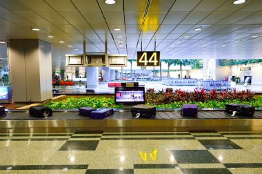 Baggage claim area of Changi Airport clipart