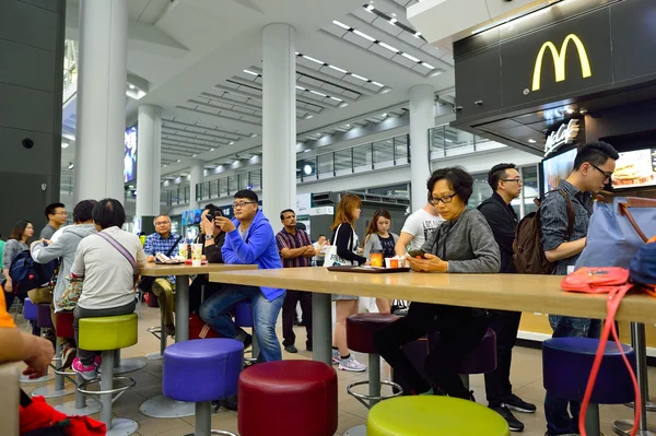 People in McDonald 's restaurant — стоковое фото