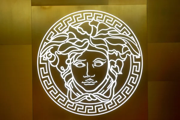 Versace logo on wall