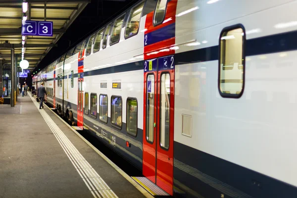 Train at railroad station — Stock Photo, Image