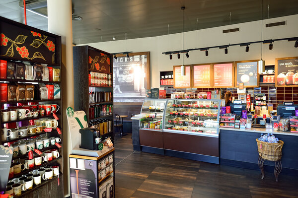 GENEVA, SWITZERLAND - NOVEMBER 18, 2015: interior of Starbucks Cafe. Starbucks Corporation is an American global coffee company and coffeehouse chain based in Seattle, Washington