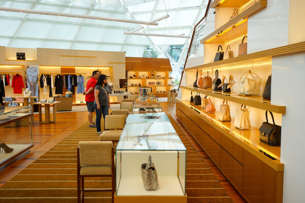 SINGAPORE - NOVEMBER 08, 2015: inside the Louis Vuitton store. Louis Vuitton is a French fashion house, one of the world's leading international fashion houses