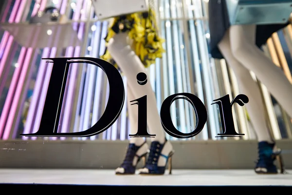 Dior Logo on glass wall — Stok fotoğraf