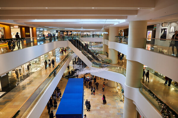 HONG KONG - DECEMBER 25, 2015: interior of shopping mall in Hong Kong. Hong Kong shopping malls are some of the biggest and most impressive in the world