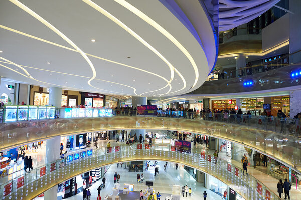 SHENZHEN, CHINA - JANUARY 23, 2016: inside of Shenzhen Vanke Plaza. Shenzhen Vanke Plaza Shopping mall is high-end complex located in the downtown area of Longgang district in ShenZhen