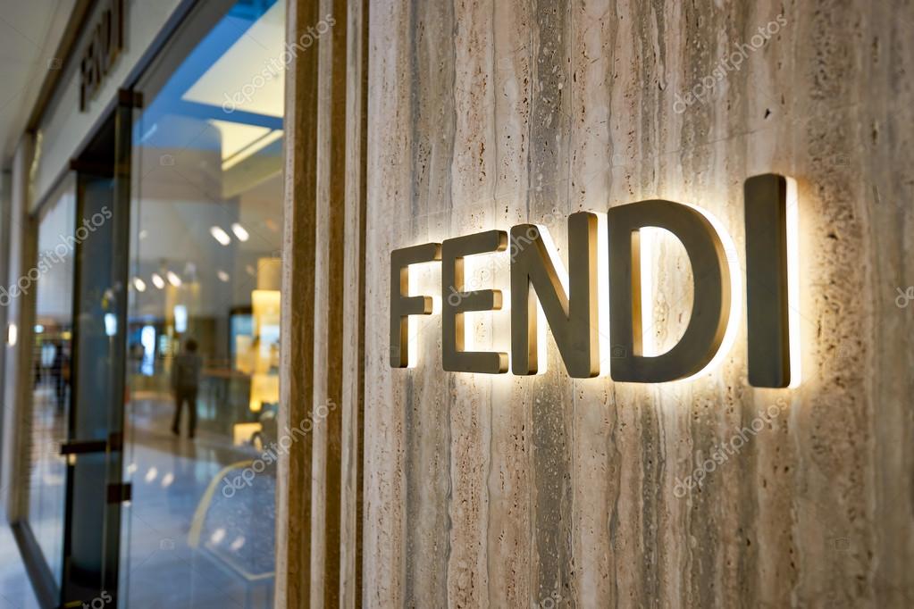 HONG KONG - JANUARY 26, 2016: Fendi logo on the wall at Elements Shopping Mall. Fendi is an Italian luxury fashion house whose specialities include fur, ready-to-wear, leather goods, shoes, fragrances, eyewear, timepieces and accessories.