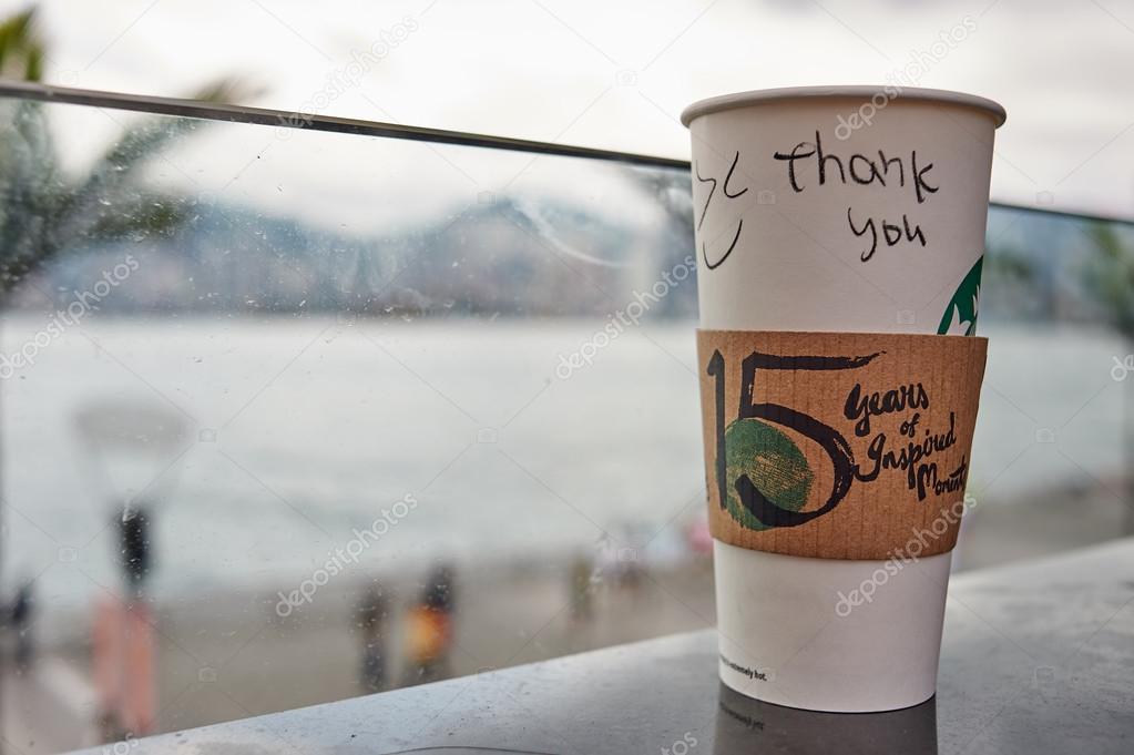 HONG KONG - MAY 06, 2015: close up shot of Starbucks cup. Starbucks Corporation is an American global coffee company and coffeehouse chain based in Seattle, Washington