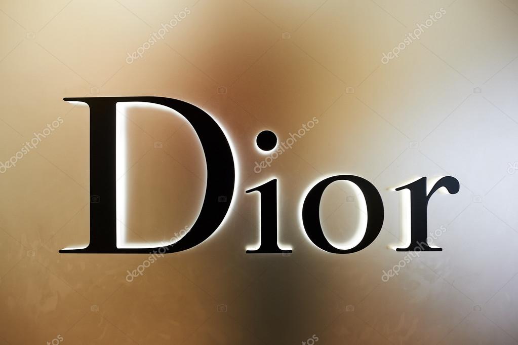 HONG KONG - DECEMBER 25, 2015:  Dior inscription on the wall. Dior, is a European luxury goods company controlled and chaired by French businessman Bernard Arnault