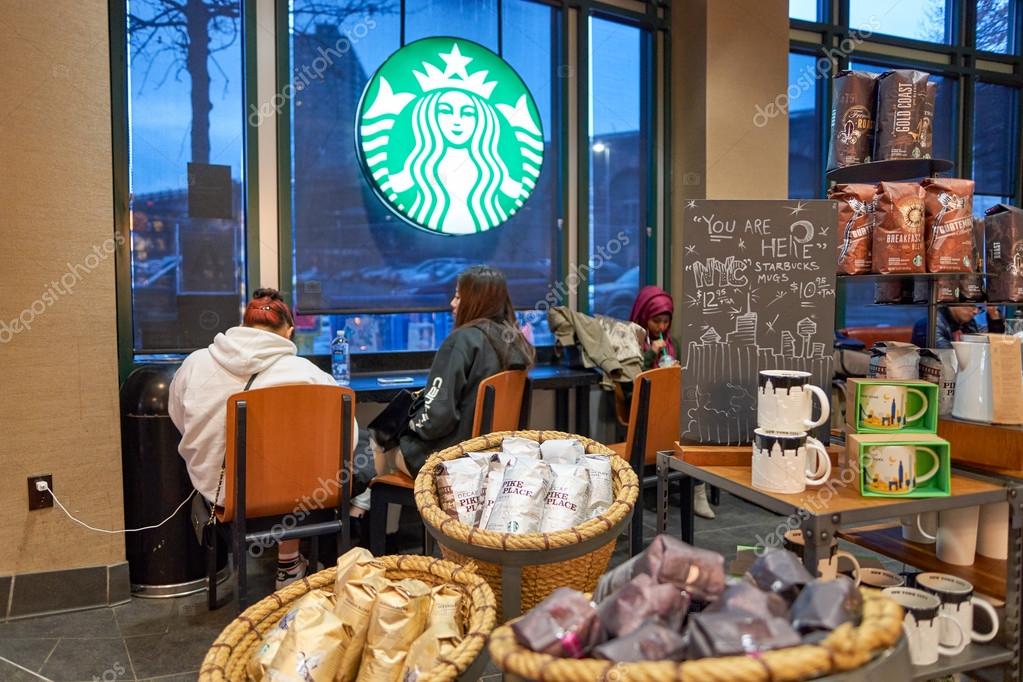 NEW YORK, USA - CIRCA MARCH 2016: inside of Starbucks Cafe. Starbucks Corporation is an American global coffee company and coffeehouse chain based in Seattle, Washington