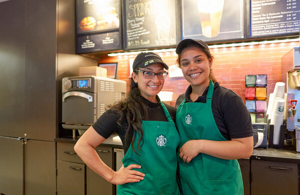 workers at Starbucks Cafe
