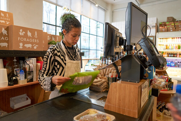 worker at food store in Brooklyn