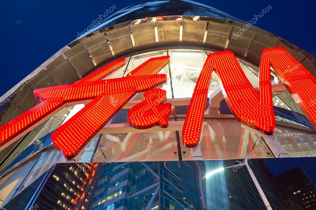 NEW YORK - CIRCA MARCH 2016: Times Square H&M store at night. H & M Hennes & Mauritz AB is a Swedish multinational retail-clothing company, known for its fast-fashion clothing for men, women, teenagers and children.