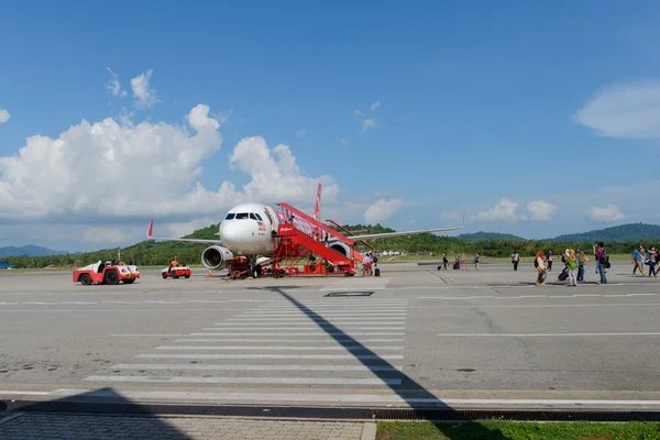 AirAsia proudové letadlo — Stock fotografie