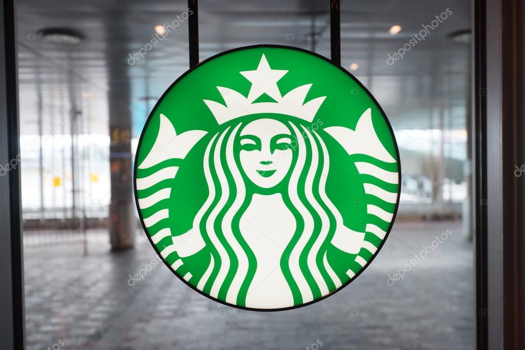 HELSINKI - SEP 03: Starbucks Cafe logo in Helsinki Airport on September 03, 2014 in Helsinki, Finland. Starbucks is the largest coffeehouse company in the world, with more then 23000 stores