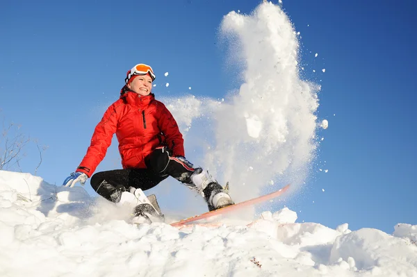 Kobieta w zabawy na snowboardzie — Zdjęcie stockowe