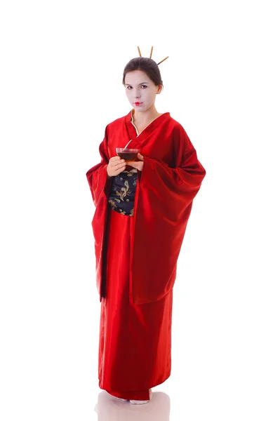 Flickan i native kostym av japanska geisha — Stockfoto