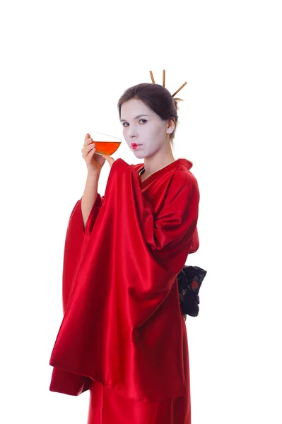 Das Mädchen im einheimischen Kostüm der japanischen Geisha — Stockfoto