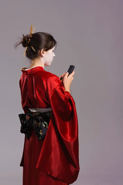 The girl in native costume of japanese geisha — Stock Photo, Image